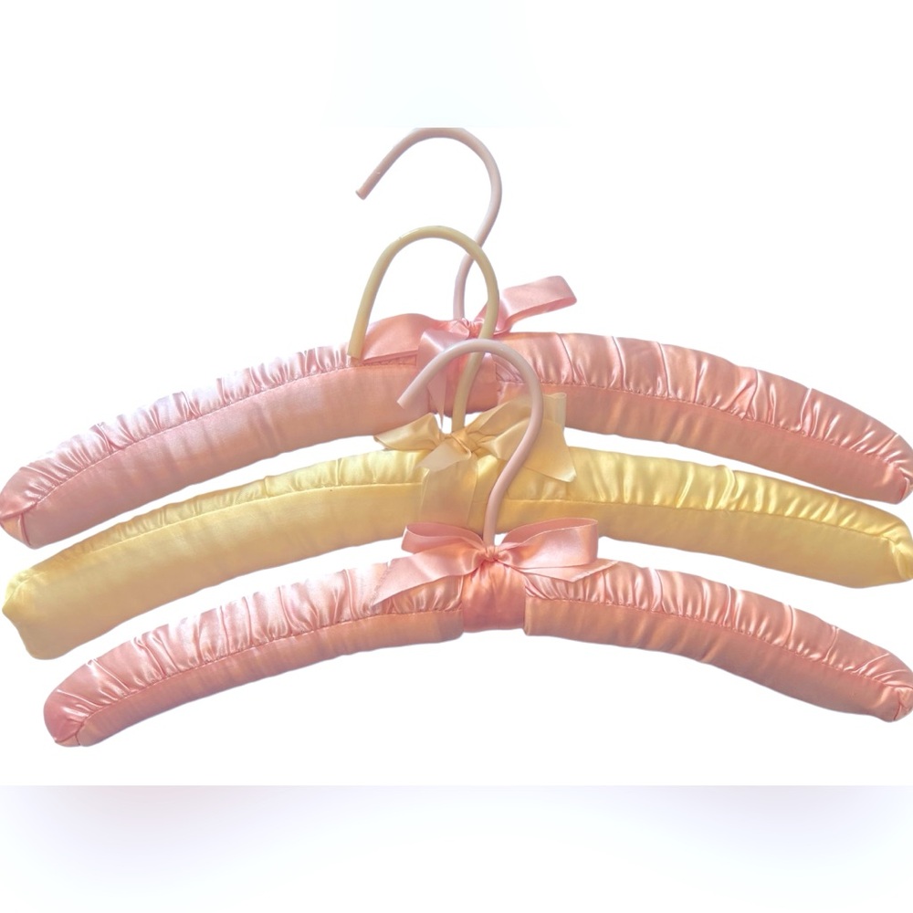 Three Luxurious Padded Satin Hangers-2 Pink and 1 Yellow Hanger.